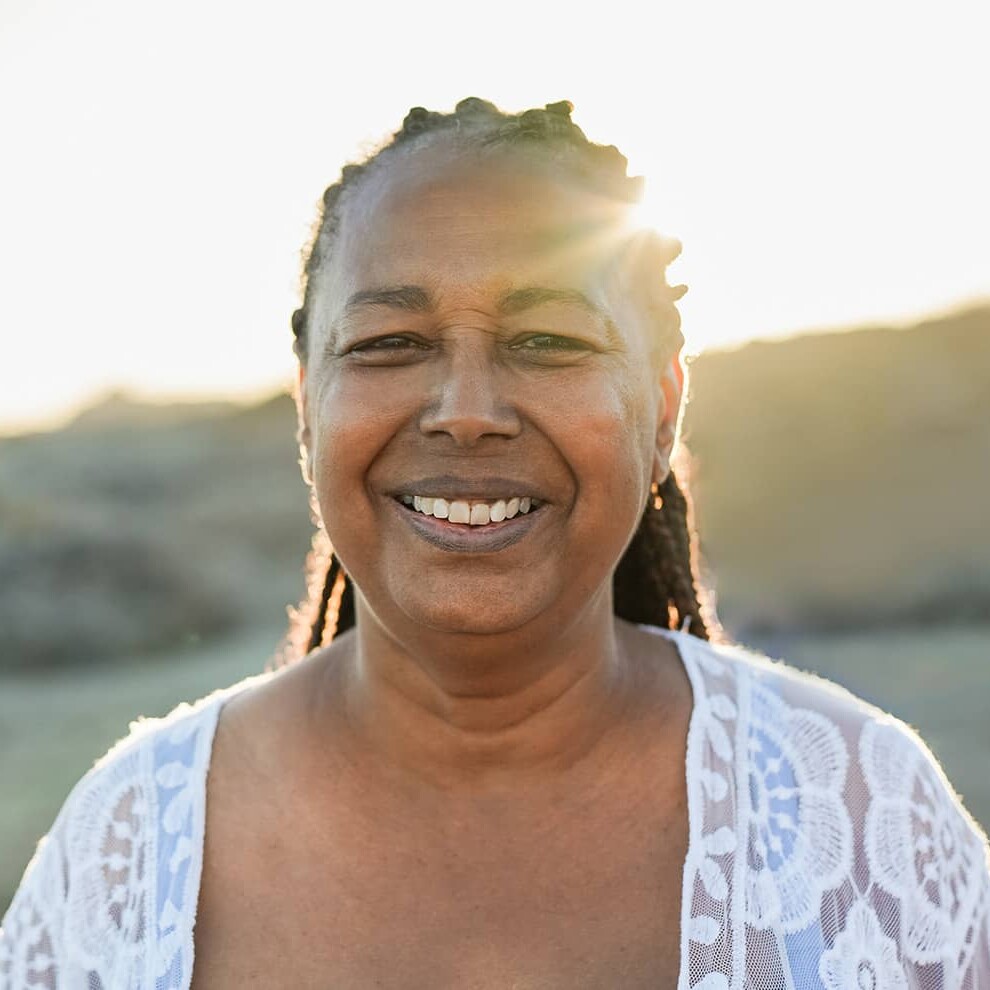 middle aged woman smiling at the camera